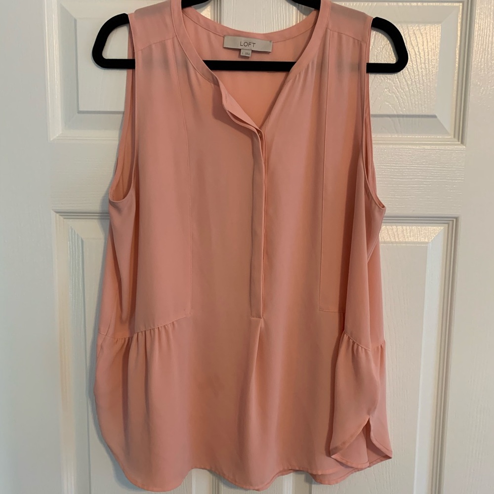 Peach sleeveless blouse
